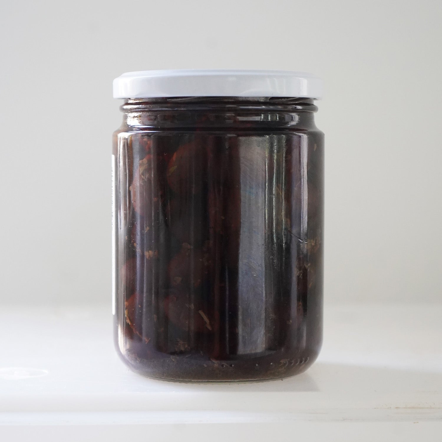Reverso tarro de cristal aceitunas negras picantes ecológicas