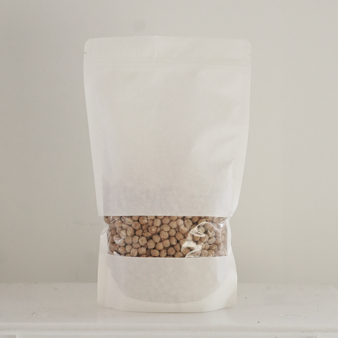 Bolsa de papel blanca con garbanzos pedrosillanos ecológicos