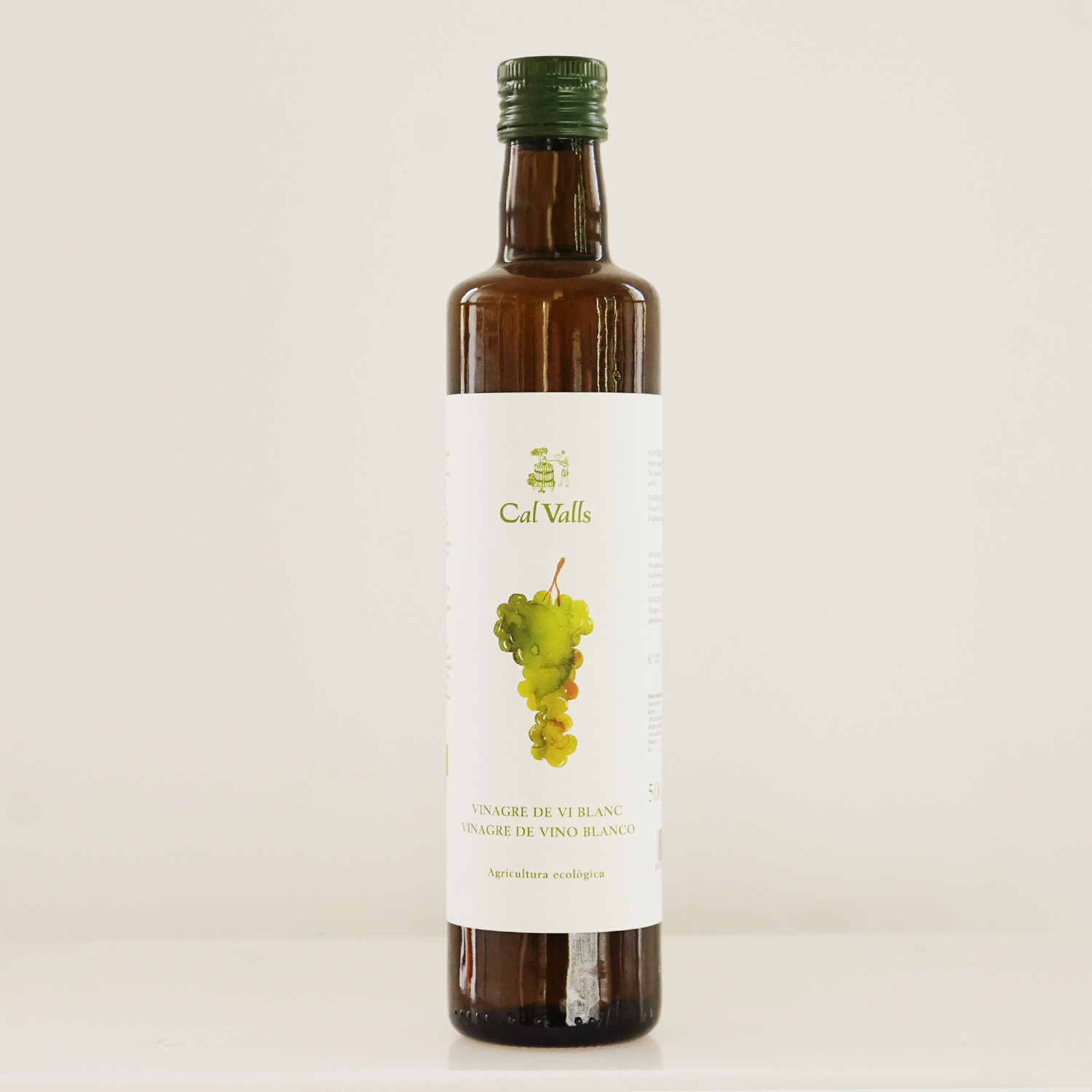 Botella de cristal vinagre de vino blanco ecológico