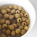 Aceitunas ecológicas deshuesadas aliñadas