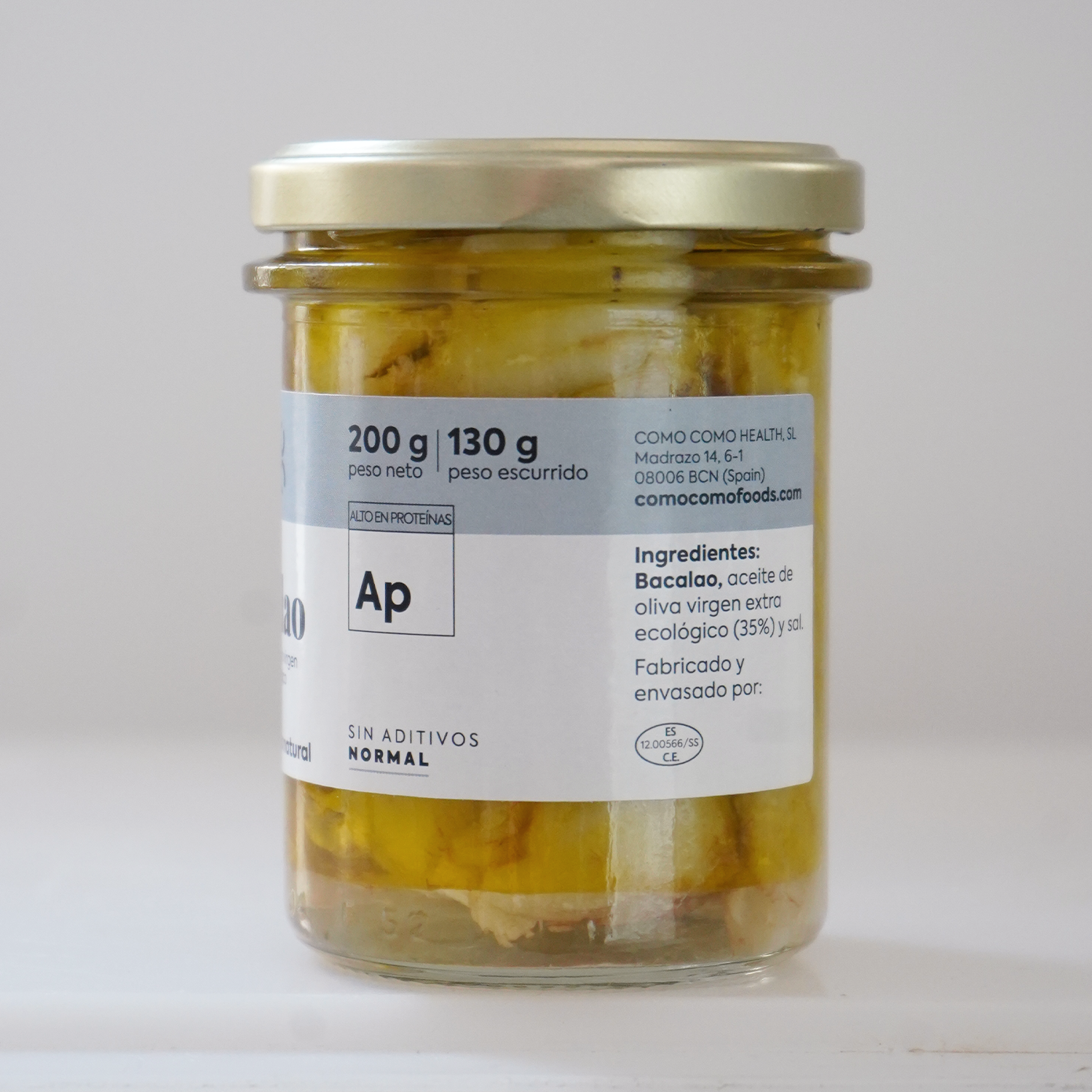 Reverso tarro de cristal con bacalao en aceite de oliva virgen extra ecológico