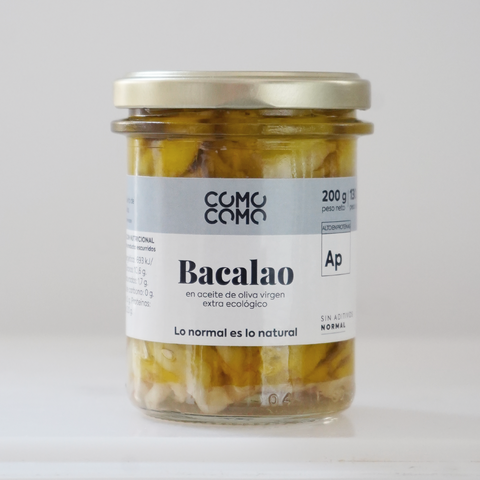 Tarro de cristal con bacalao en aceite de oliva virgen extra ecológico