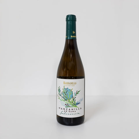 Botella de manzanilla en rama salicornia